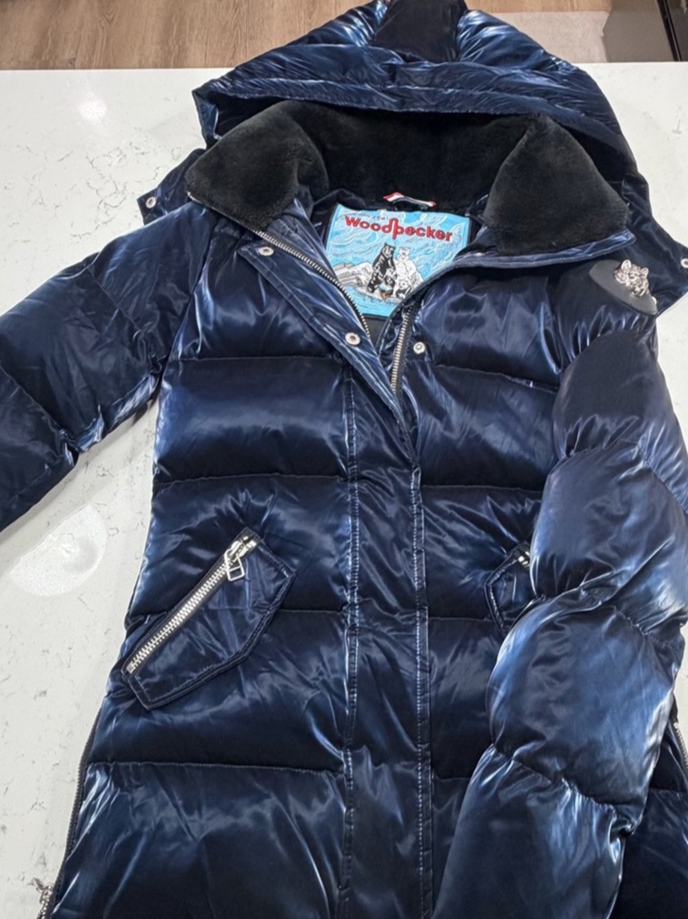 Woodpecker women’s winter puffer jacket, size XSmall, in a beautiful glossy navy